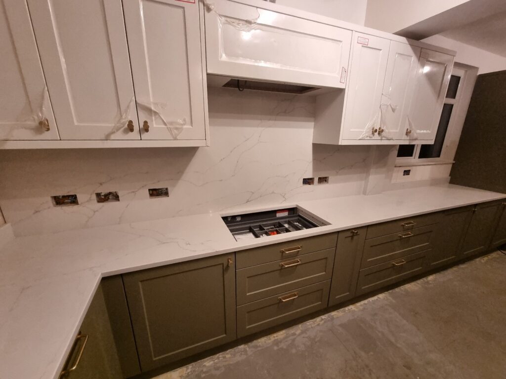New Bianco Fontana quartz worktops installed to update this existing kitchen in Sussex